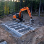 Excavating for new foundations and additions.